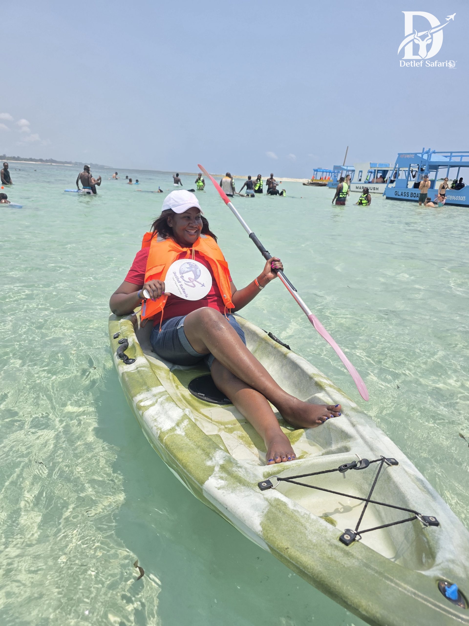 Kayaking in shallow turquoise waters