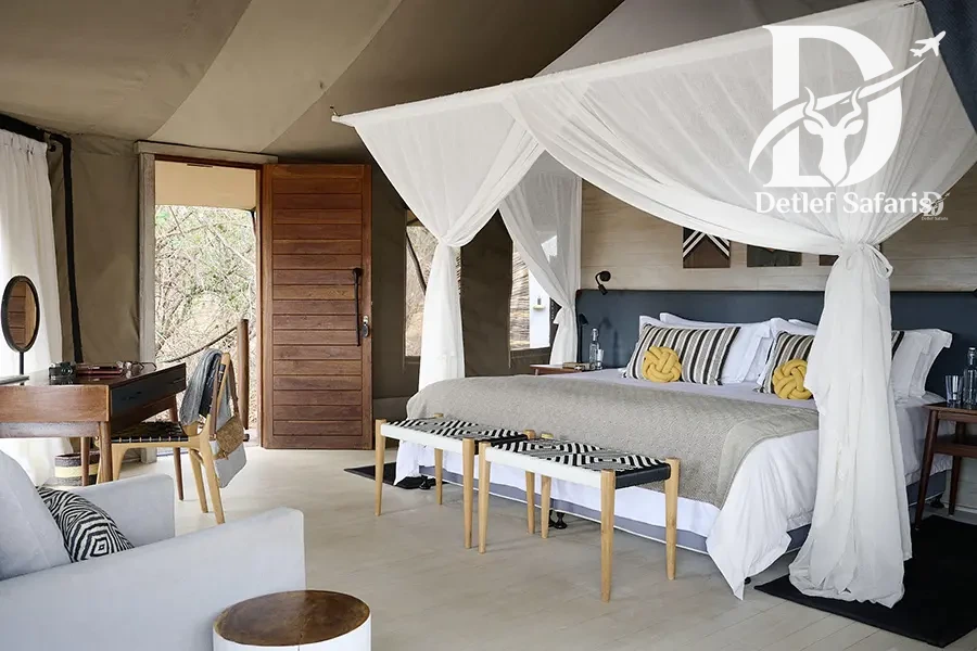 Sanctuary Swala Camp tented suite shaded by acacia woodland, Tarangire National Park, Tanzania