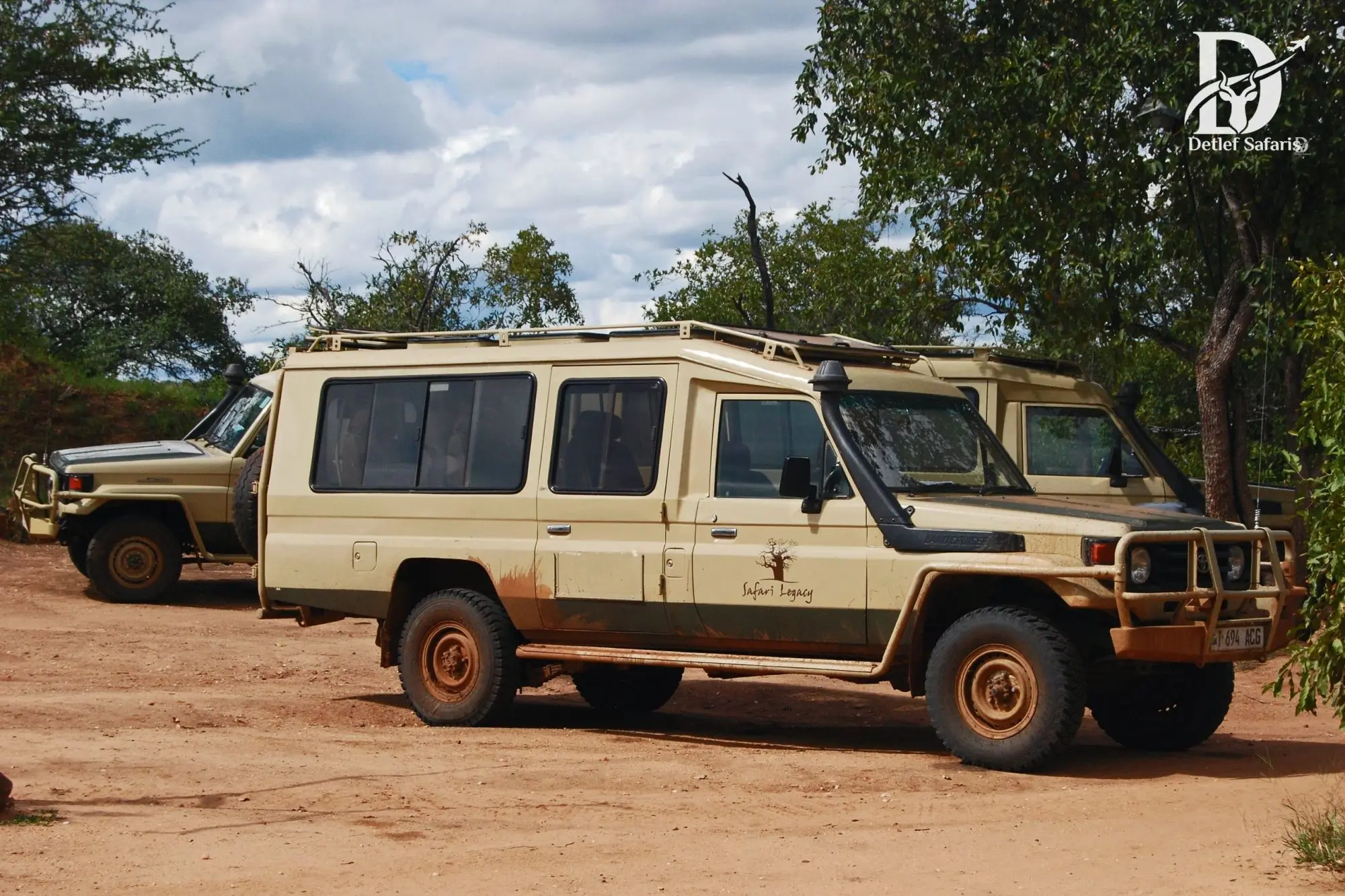 Safari vehicles on the road in Tarangire National Park
