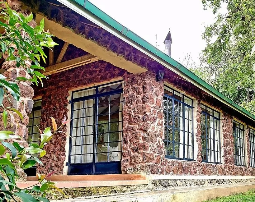 Clouds Mountain Gorilla Lodge stone cottage, Volcanoes National Park, Rwanda