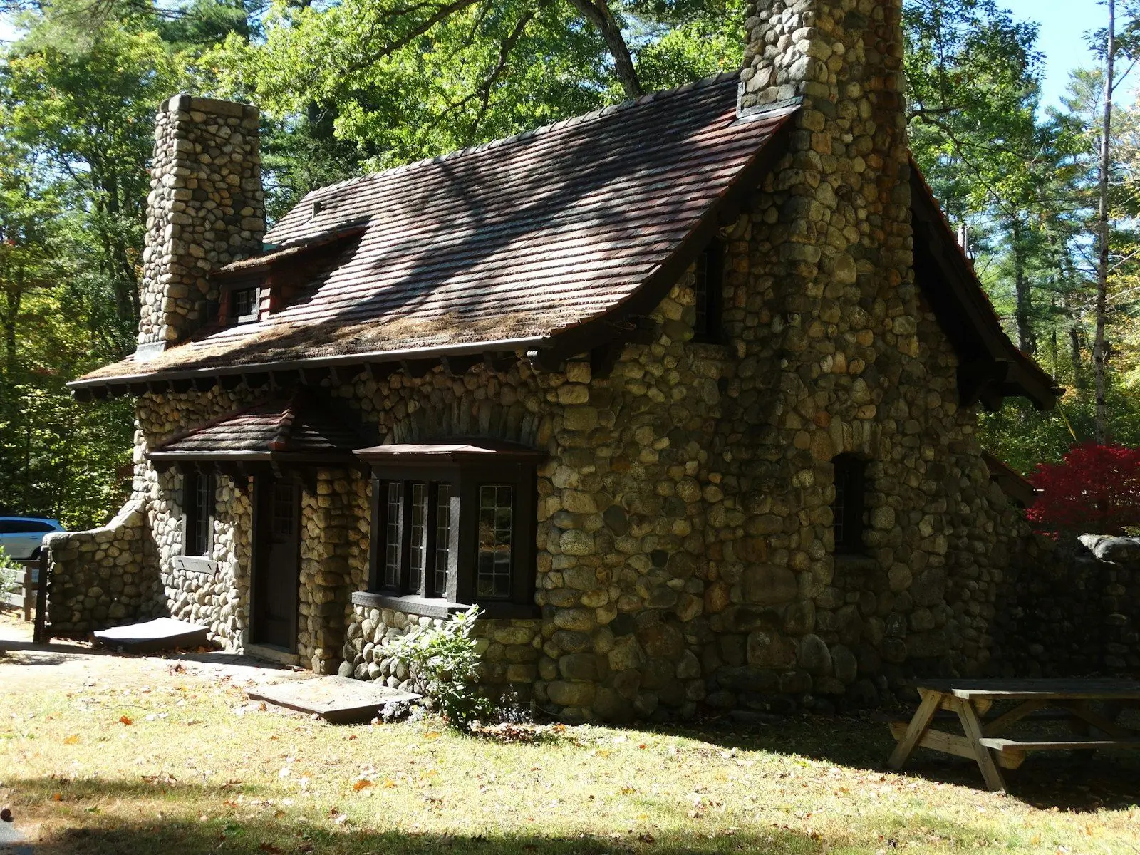 Mount Gahinga Lodge stone cottages beneath the Virunga volcanoes, Mgahinga Gorilla National Park, Uganda
